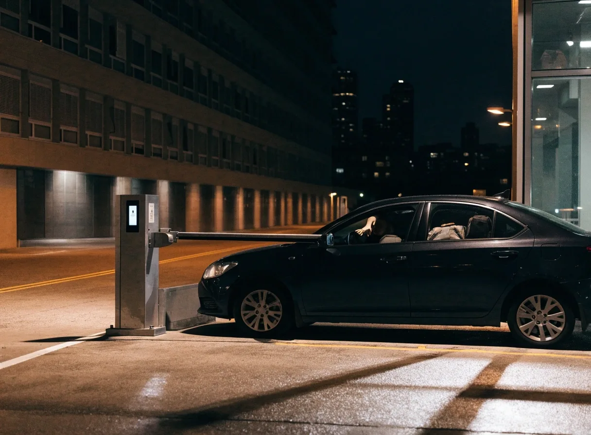 Empty accessible bay on a parking deck at night